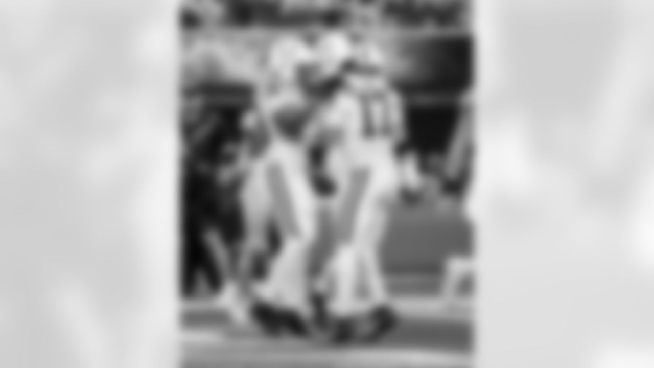 RB Jonathan Taylor #28, G Quenton Nelson #56 and QB Daniel Jones #17