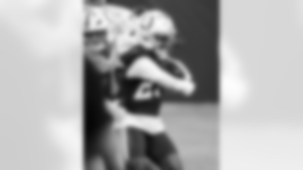 T Bernhard Raimann #79 and CB Justin Walley #27