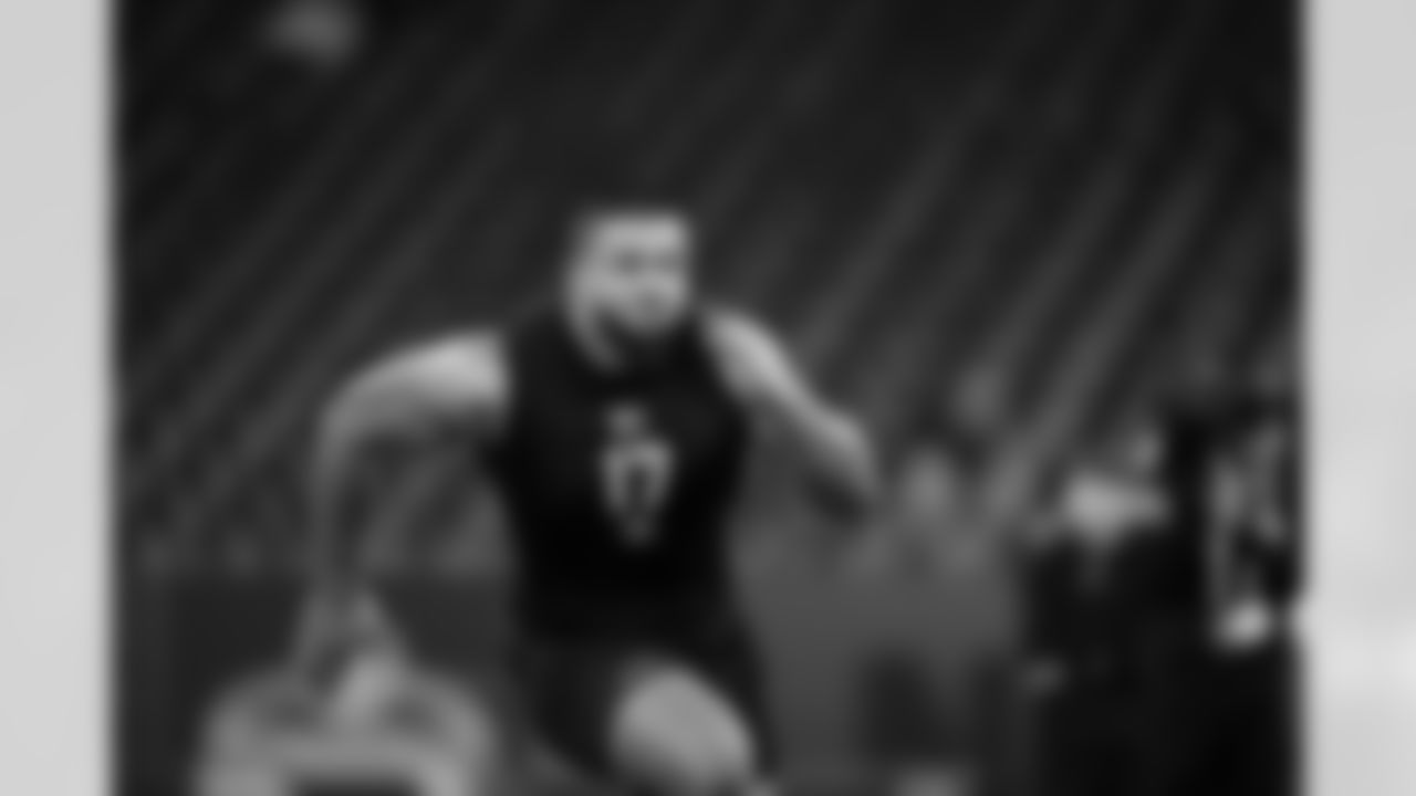 Kansas offensive lineman Enrique Cruz Jr. (17) participates in a drill during the 2026 NFL Scouting Combine on Sunday, March 1, 2026 in Indianapolis, Indiana. (Cooper Neill/NFL)