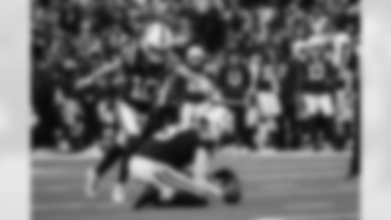 K Blake Grupe #10 and P Rigoberto Sanchez #8