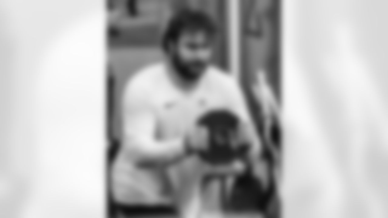 RB Jonathan Taylor #28 and G Tanor Bortolini #60