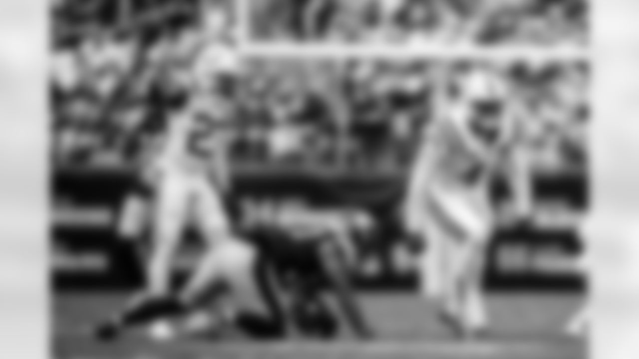 CB Kenny Moore II #23 and LB Zaire Franklin #44