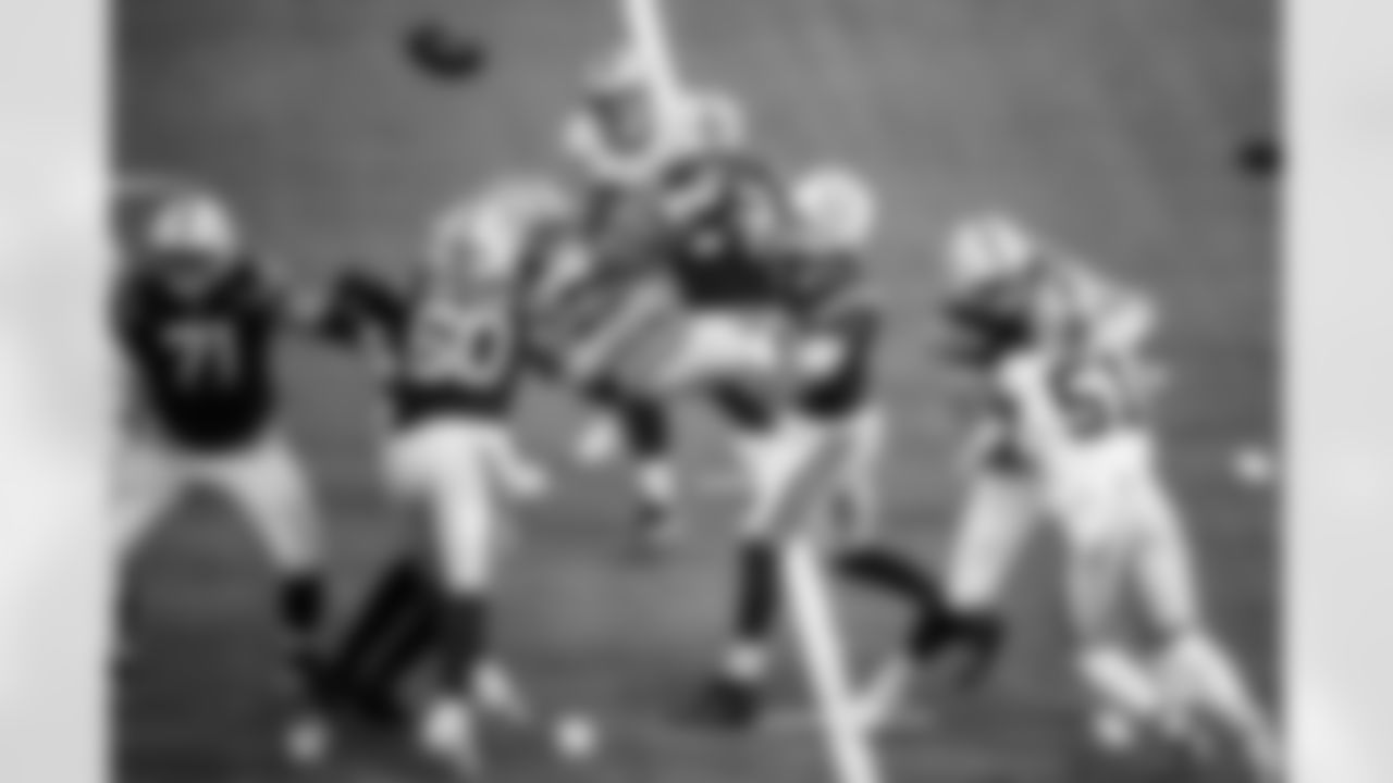 G Matt Goncalves #71, C Tanor Bortolini #60, T Braden Smith #72 and QB Daniel Jones #17