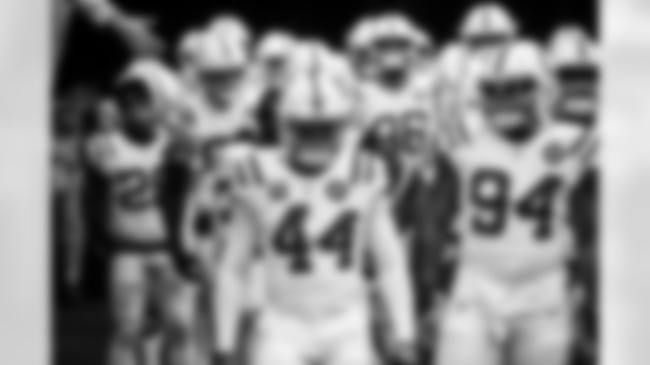 LB Zaire Franklin #44, DE Tyquan Lewis #94 and DT Neville Gallimore #92