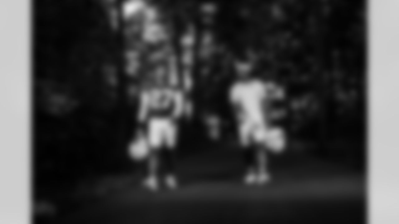 CB Justin Walley #27 and RB Tyler Goodson #31