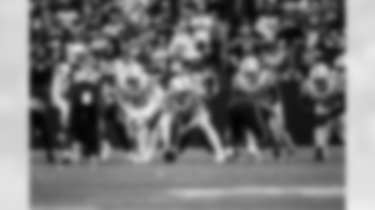 DT Adetomiwa Adebawore #95, LS Luke Rhodes #46 and TE Drew Ogletree #85