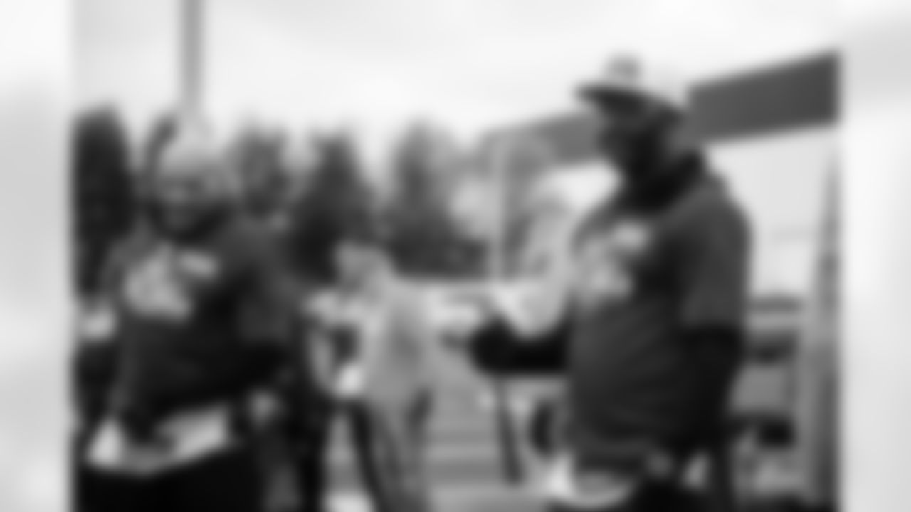 Jerome Henderson Defensive Backs Coach and Reggie Wayne Wide Receivers