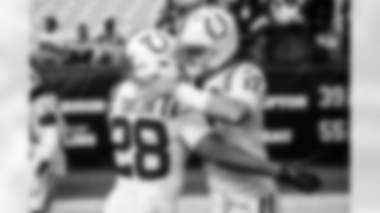 RB Jonathan Taylor #28 and QB Daniel Jones #17