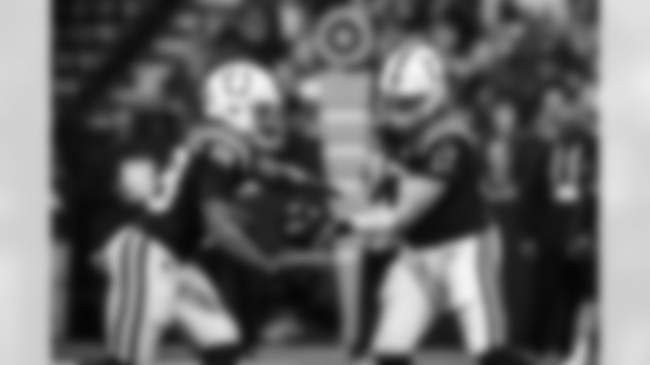 RB Jonathan Taylor #28 and QB Phillip Rivers #17