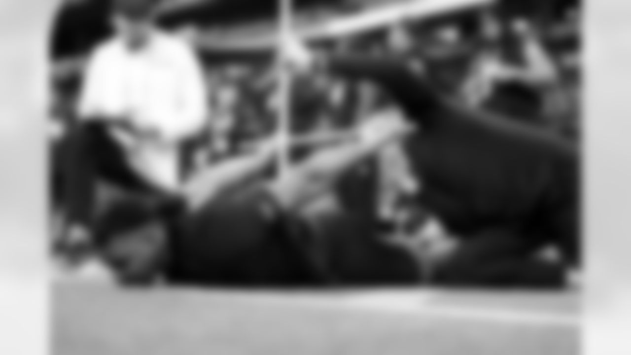 Texas A&M defensive lineman Tyler Onyedim (23) stretches during the 2026 NFL Scouting Combine on Thursday, February 26, 2026 in Indianapolis, Indiana. (Cooper Neill/NFL)