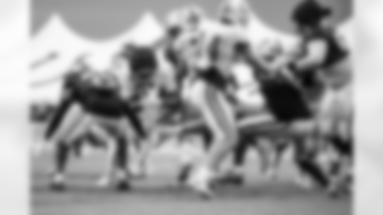 CB Samuel Womack III #33, RB Jonathan Taylor #28 and WR Alec Pierce #14