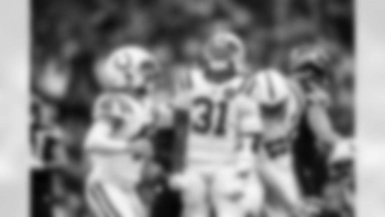 LS Luke Rhodes #46 and RB Tyler Goodson #31