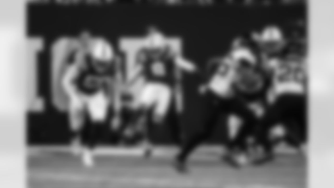 LB Segun Olubi #50 and P Rigoberto Sanchez #8