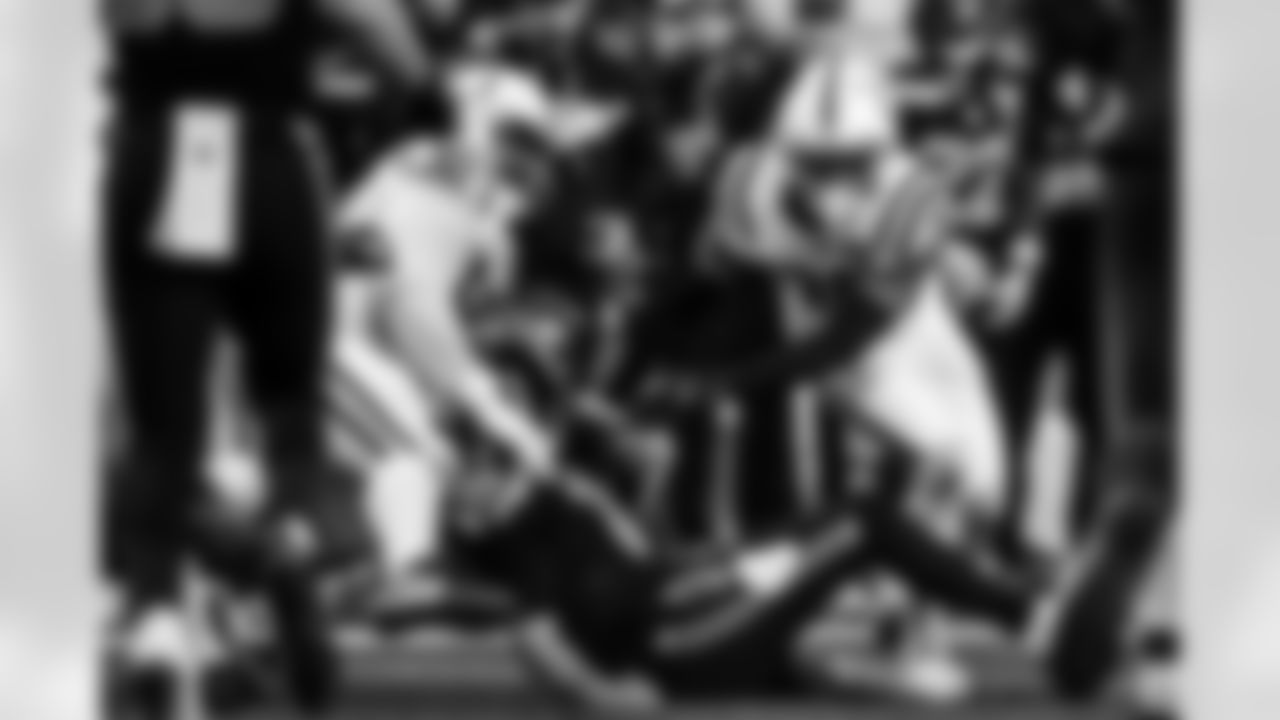 DT Neville Gallimore #92 and CB Jonathan Edwards #35