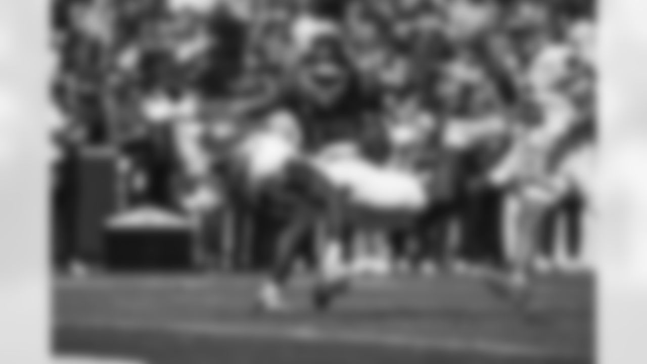 Notre Dame running back Jadarian Price (24) dives to the one yard line in front of Arkansas defensive back Kani Walker (13) during an NCAA college football game Saturday, Sept. 27, 2025, in Fayetteville, Ark. (AP Photo/Michael Woods)