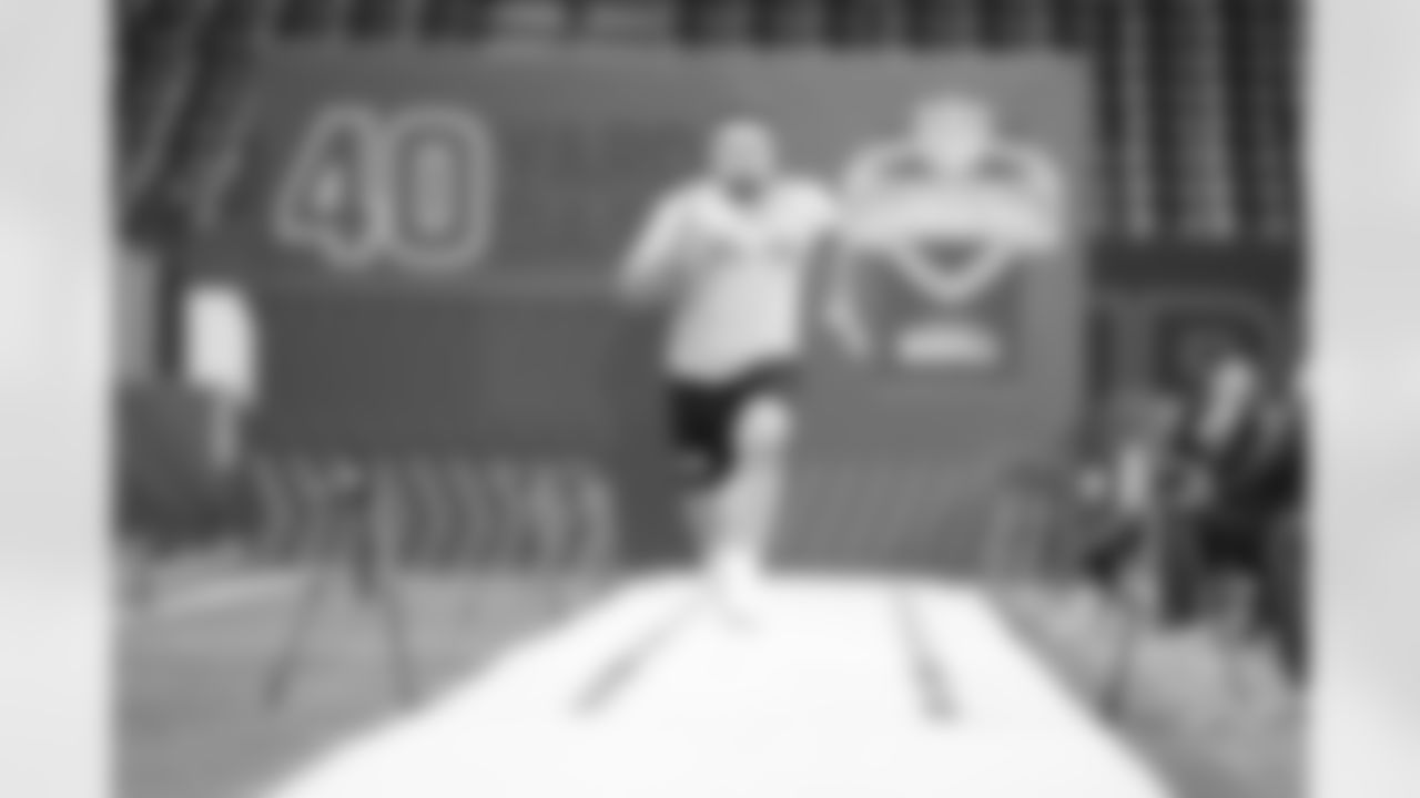 Wisconsin offensive lineman Tanor Bortolini runs the 40-yard dash at the NFL football scouting combine, Sunday, March 3, 2024, in Indianapolis. (AP Photo/Michael Conroy)