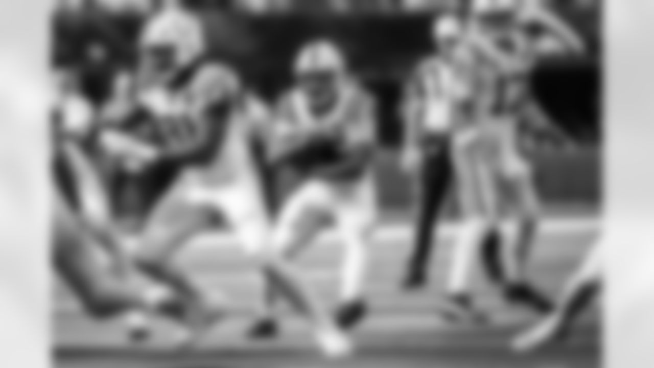 TE Mo Alie-Cox #81, RB Jonathan Taylor #28 and QB Daniel Jones #17