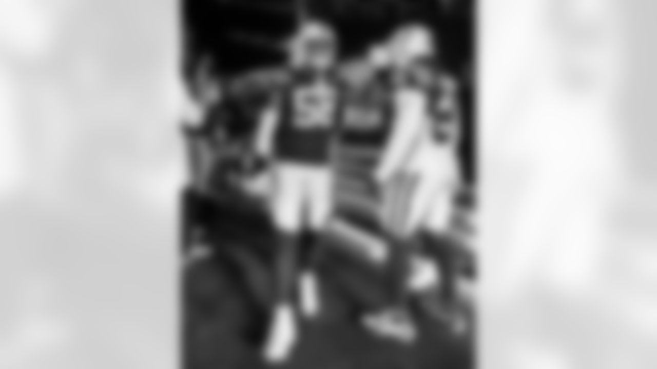 LB Austin Ajiake #58 and LB Zaire Franklin #44