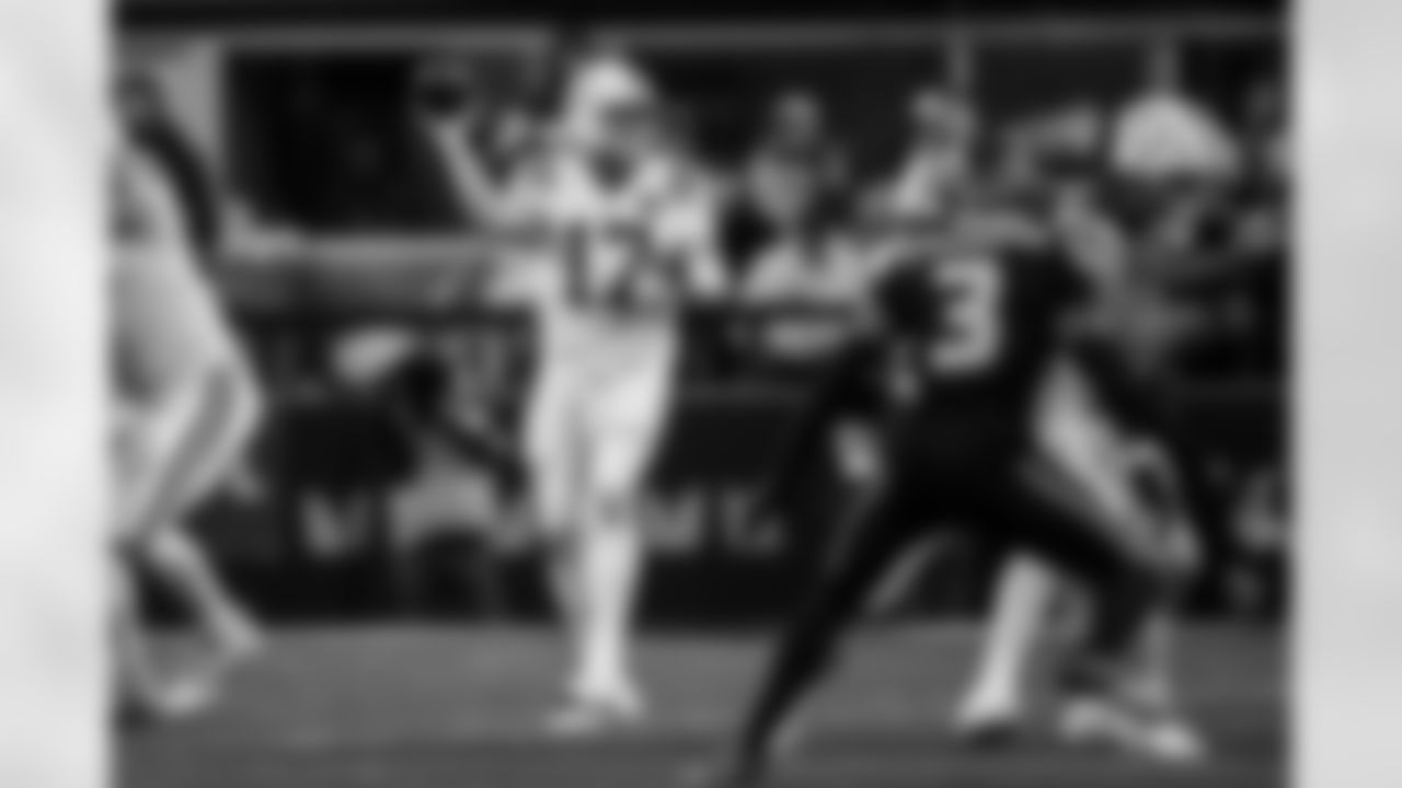 QB Philip Rivers #17 and G Tanor Bortolini #60