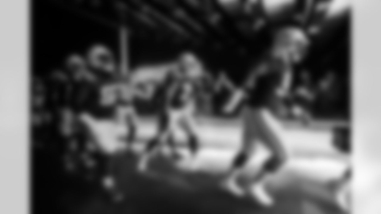 LB Austin Ajiake #58, DL Neville Gallimore #92, OL Jalen Travis #75 and DL Eric Johnson II #98