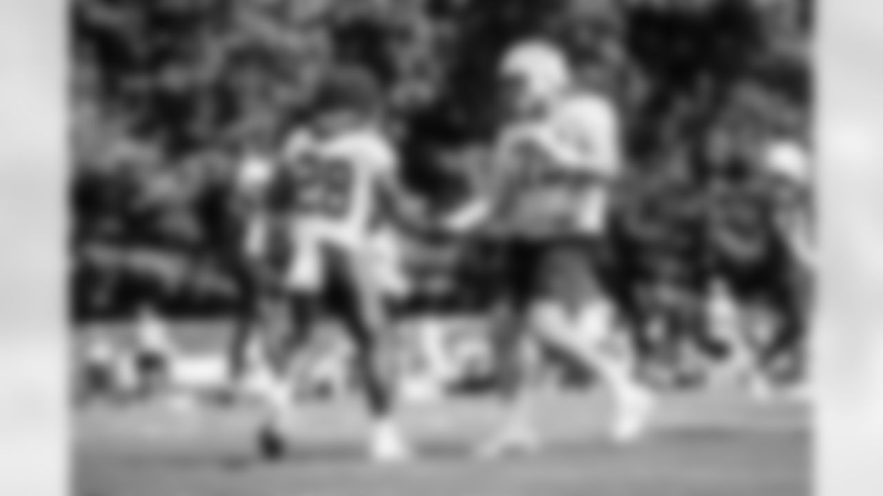 RB Jonathan Taylor #28 and T Bernhard Raimann #79
