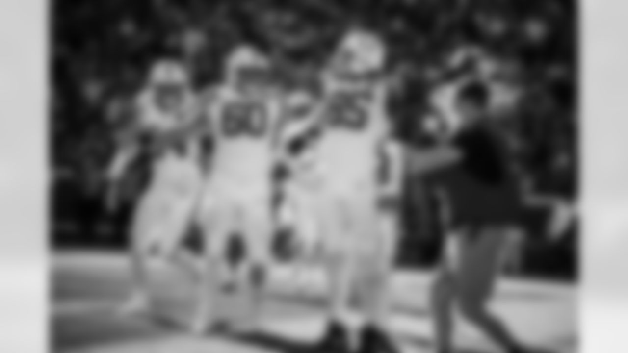 TE Tyler Warren #84, G Tanor Bortolini #60 and TE Drew Ogletree #85