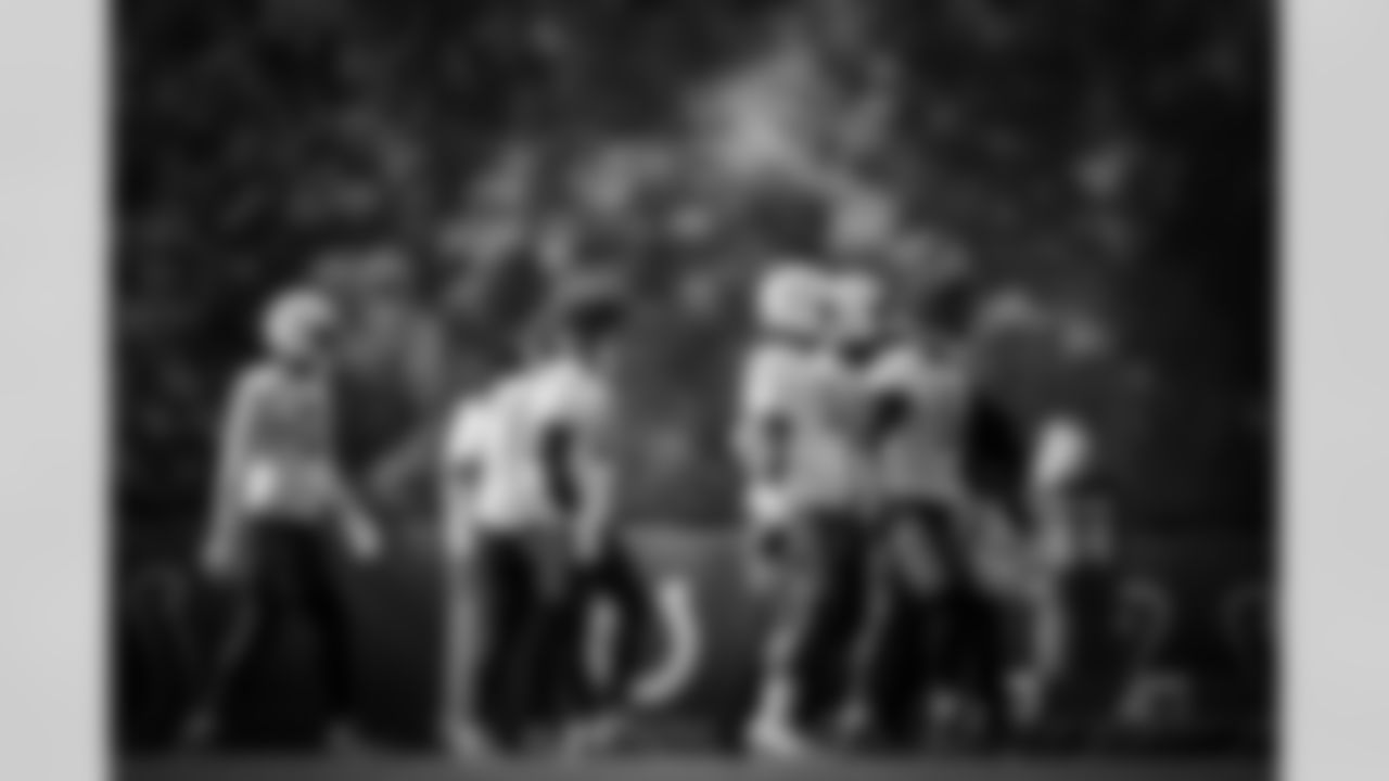 DE Durell Nchami #74, DT Eric Johnson II #98 and DE Kwity Paye #51