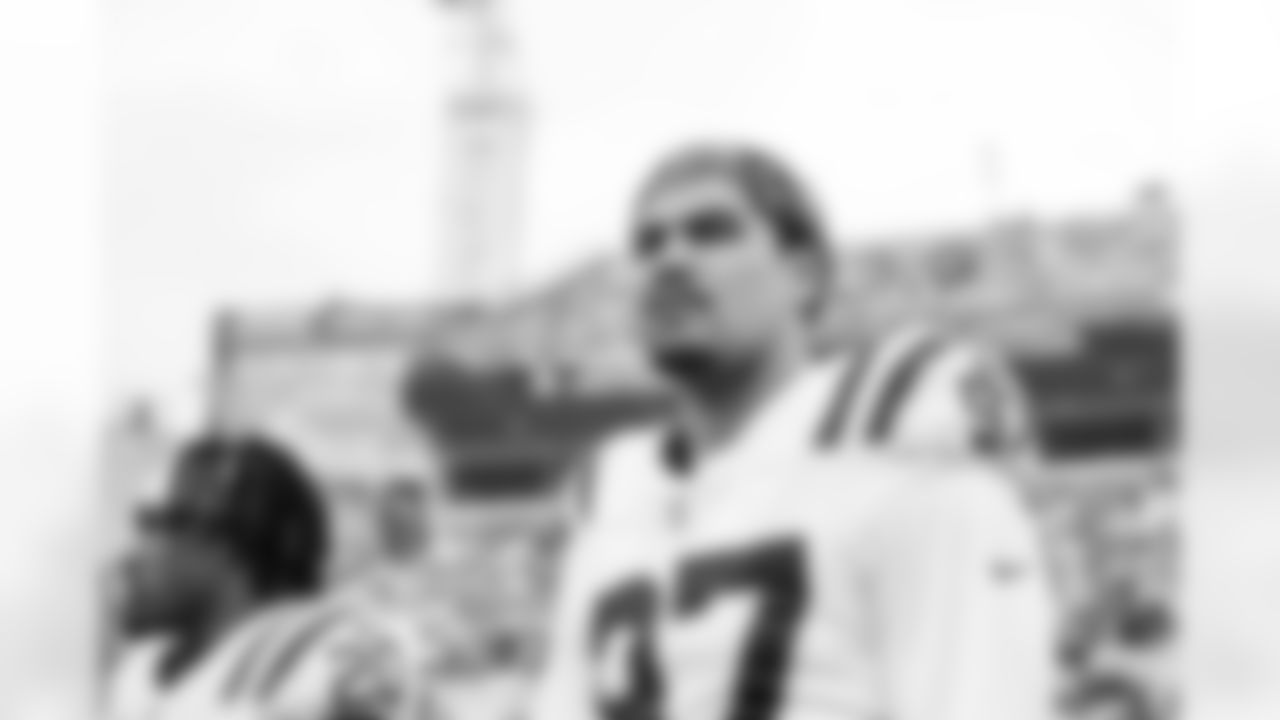 S Nick Cross #20 and DE Laiatu Latu #97