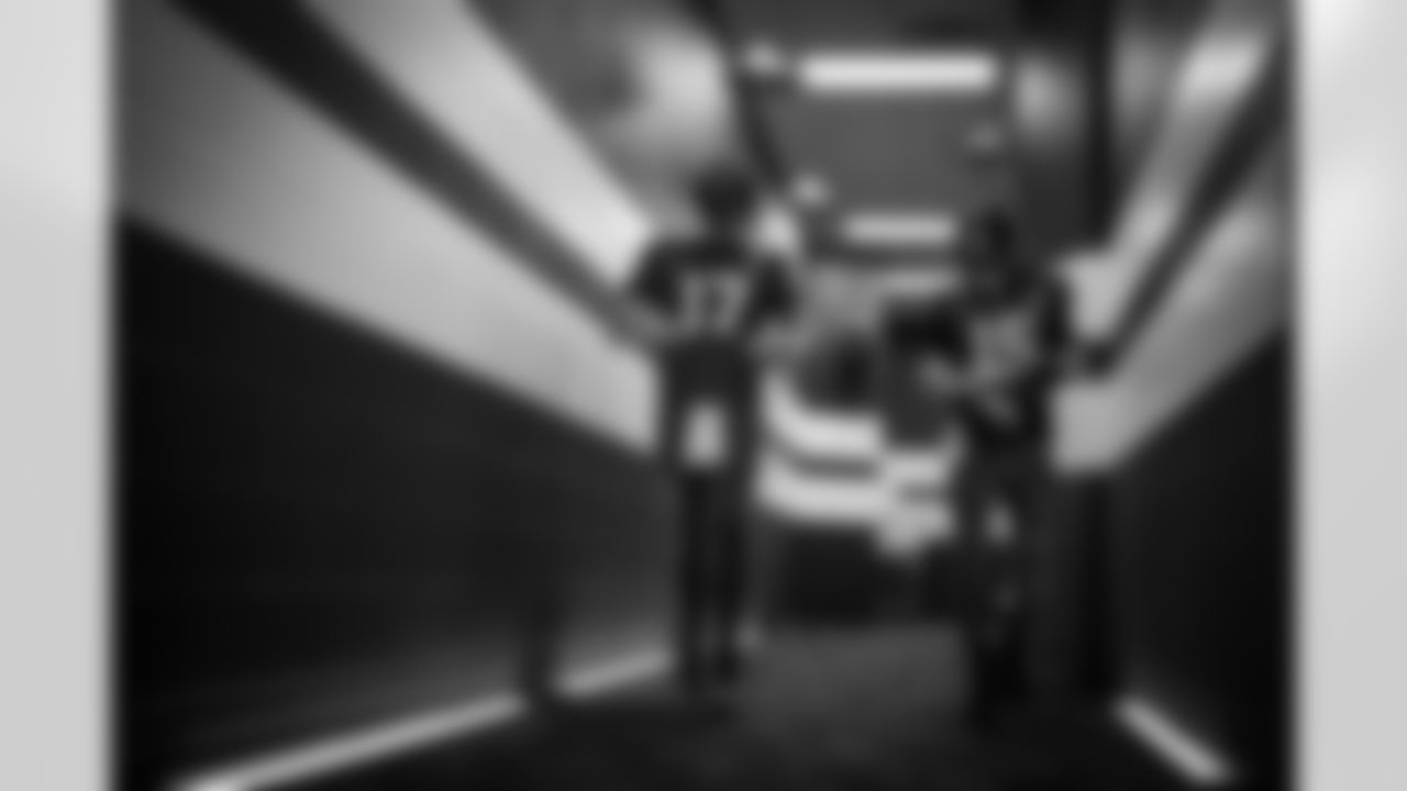 QB Phillip Rivers #17 and QB Riley Leonard #15