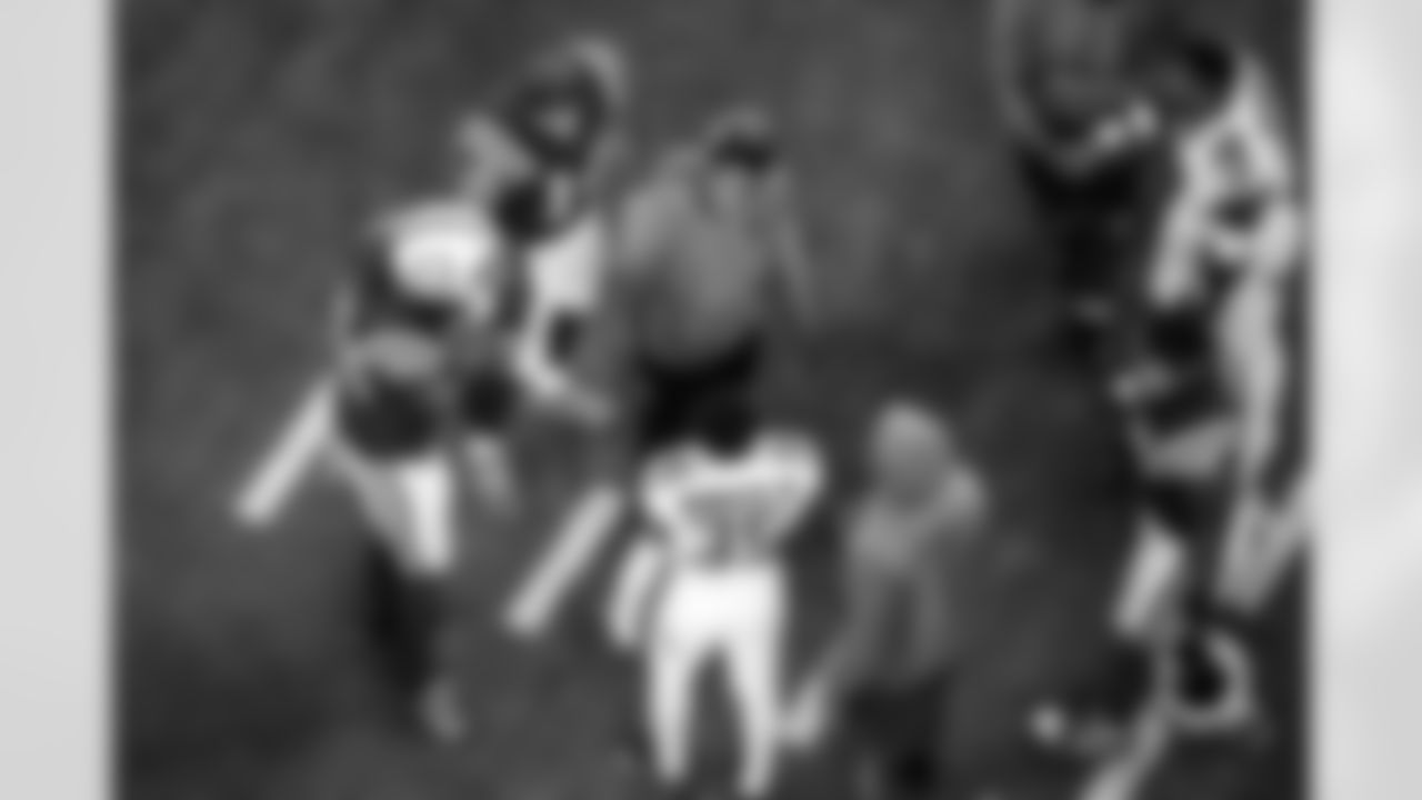 LB Segun Olubi #50, WR Alec Pierce #14, CB Jaylon Jones #40 and LB Austin Ajiake #58