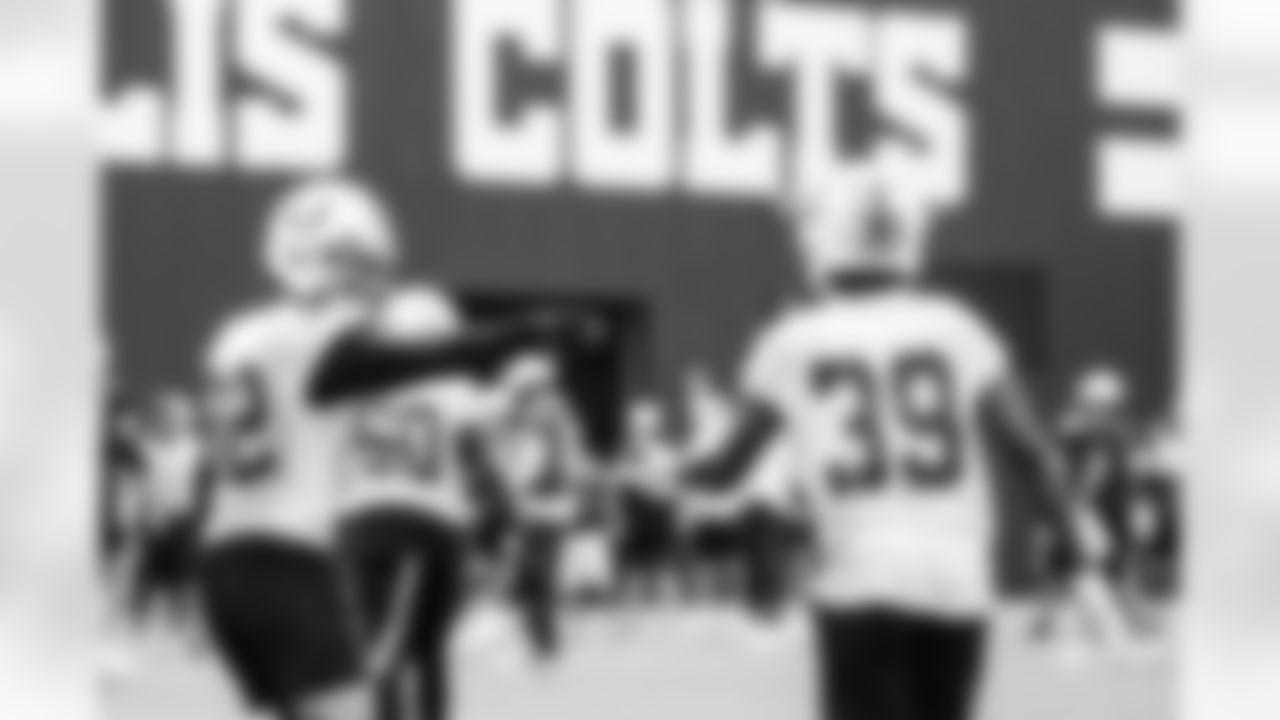 CB Alex Johnson #39 and S Daniel Scott #32
