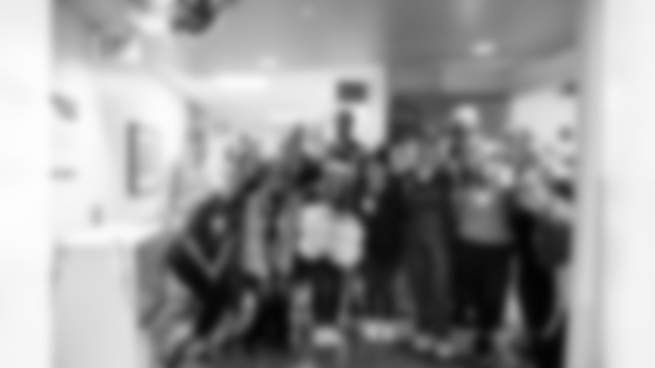 Allison B., DE Viliami Fehoko Jr. #96, LB Austin Ajiake #58 and WR Eli Pancol#83