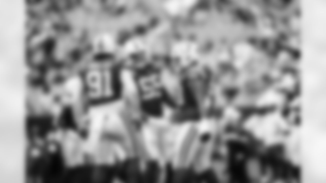 DE JT Tuimoloau #91, DE Isaiah Land #55 and DT Josh Tupou #69