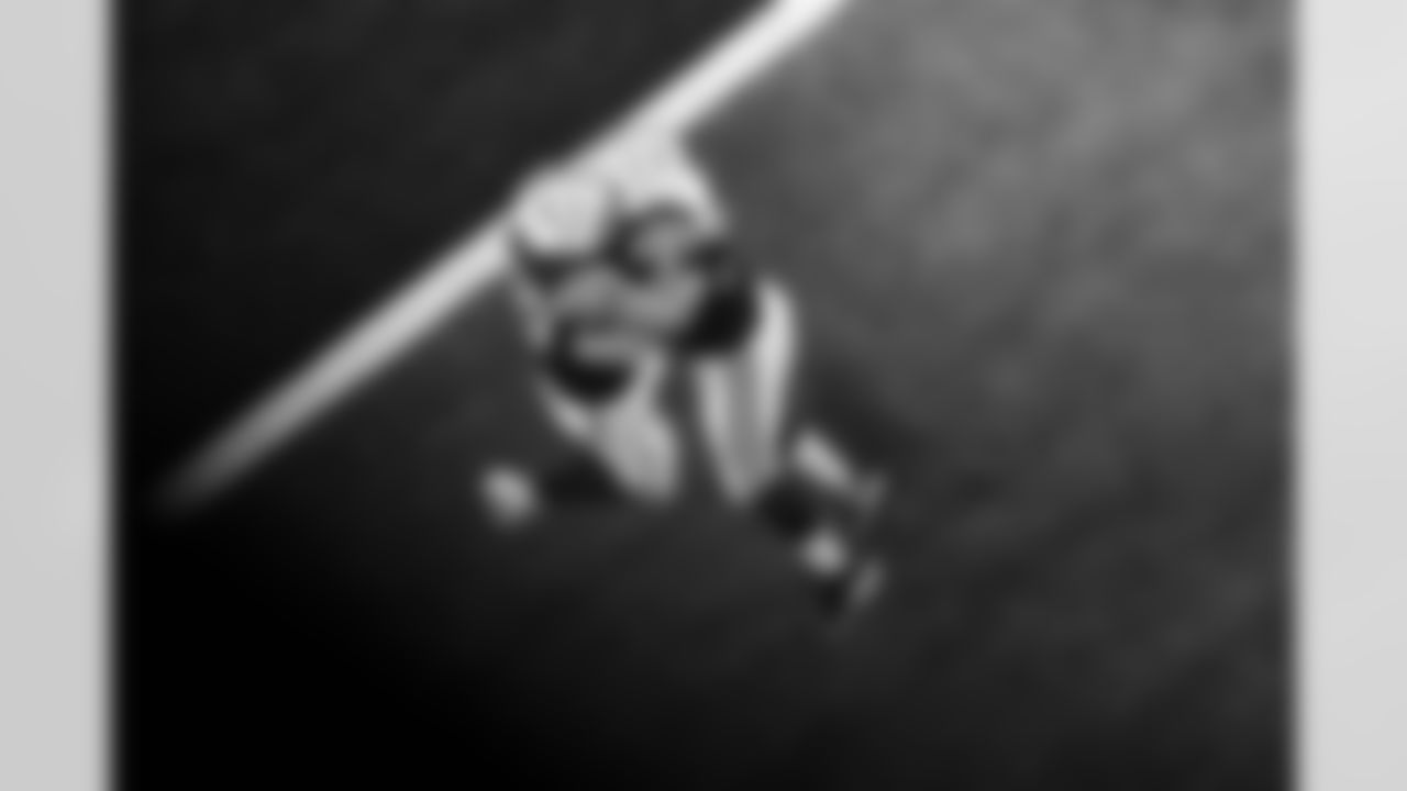 C Tanor Bortolini #60 and T Braden Smith #72