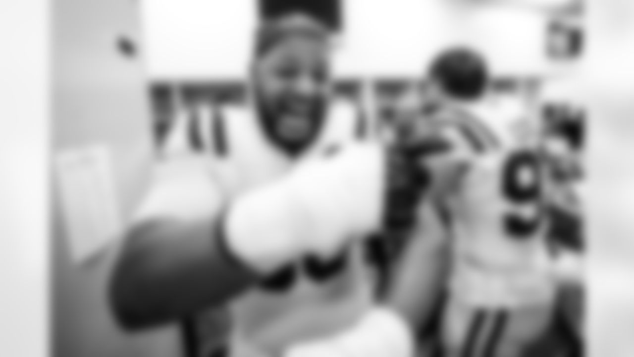 DT Grover Stewart #90, Kalon Humphries Tony Dungy Diversity Coaching Fellow and DE Laiatu Latu #97
