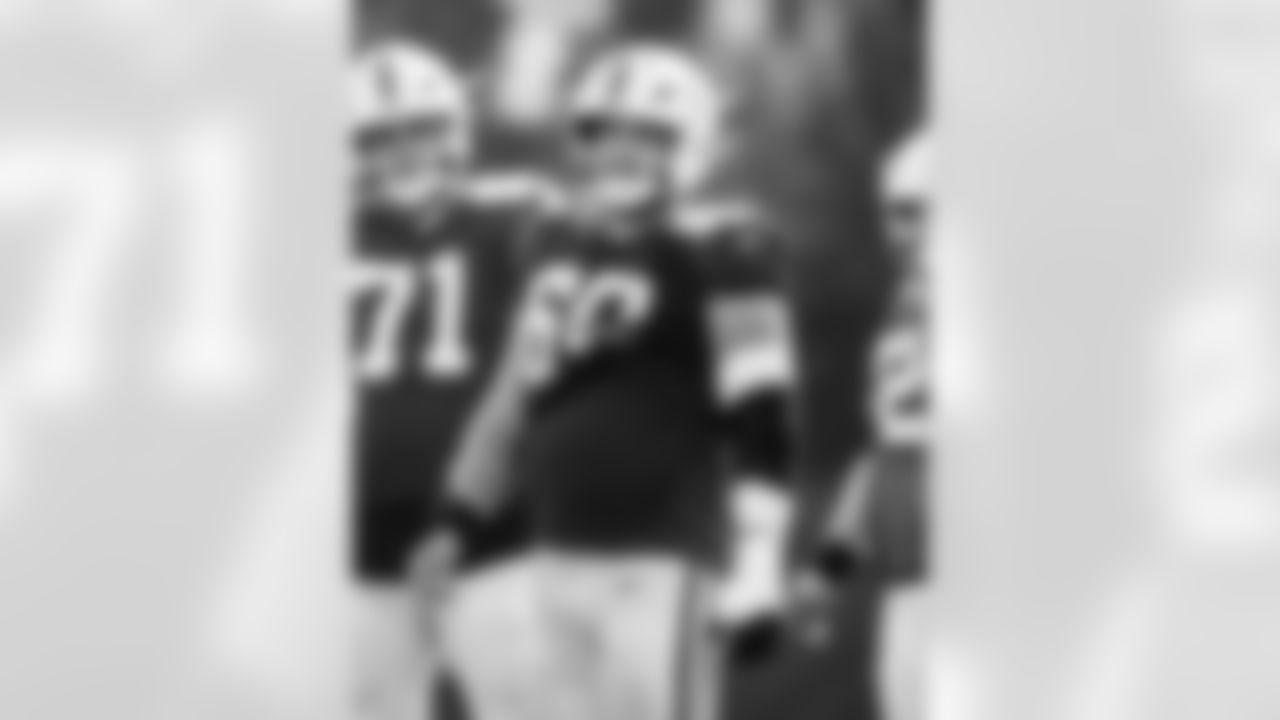 OL Matt Goncalves #71 and G Tanor Bortolini #60