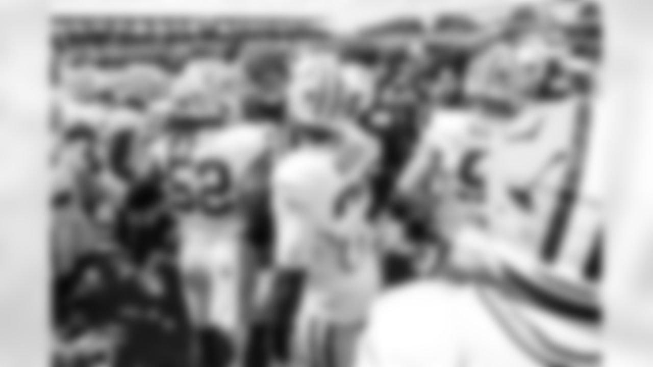 DT Grover Stewart #90 and DE JT Tuimoloau #91