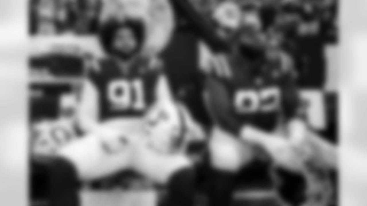 DE JT Tuimoloau #91 and DT Neville Gallimore #92
