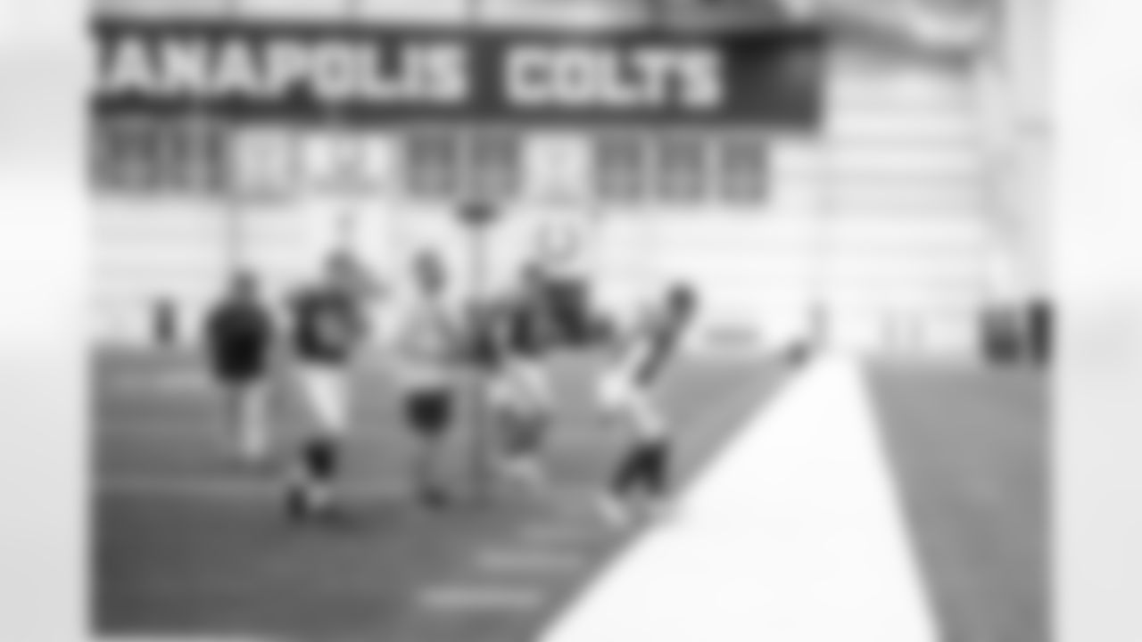 Matt Conti Vice President of Football Communications, S Nick Cross #20, QB Riley Leonard #15, Matt Bowen - Creative Director of Photographic Services, QB Daniel Jones #17 and QB Anthony Richardson #5