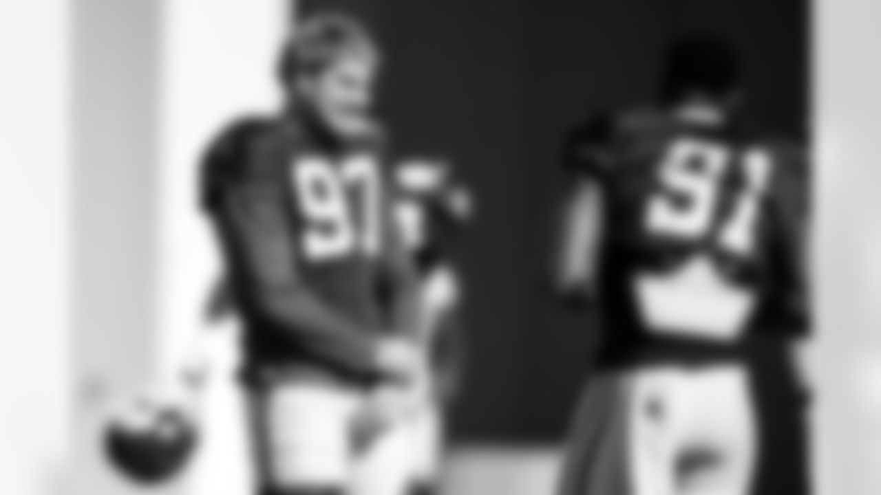 DE Laiatu Latu #97 and DE Titus Leo #91