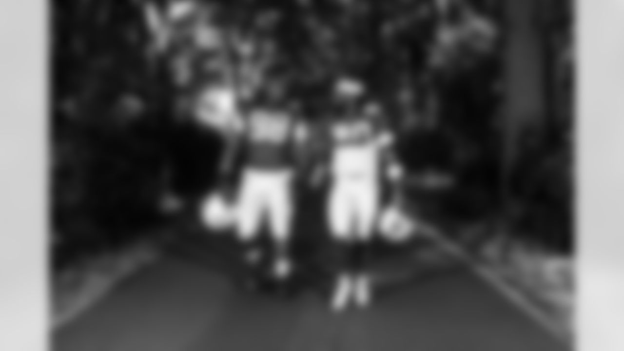 DT Eric Johnson II #98 and LB Segun Olubi #50