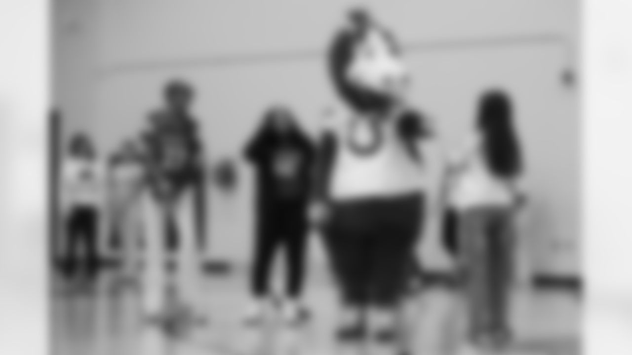 Colts mascot Blue fist bumps a student during a GENYOUth clinic on Tuesday, Feb. 24, 2026, at Fall Creek Valley Middle School in Indianapolis. (Jerod Ringwald/AP Content Services for the NFL)