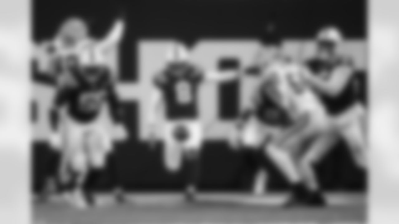 LB Segun Olubi #50, P Rigoberto Sanchez #8 and DT Adetomiwa Adebawore #95