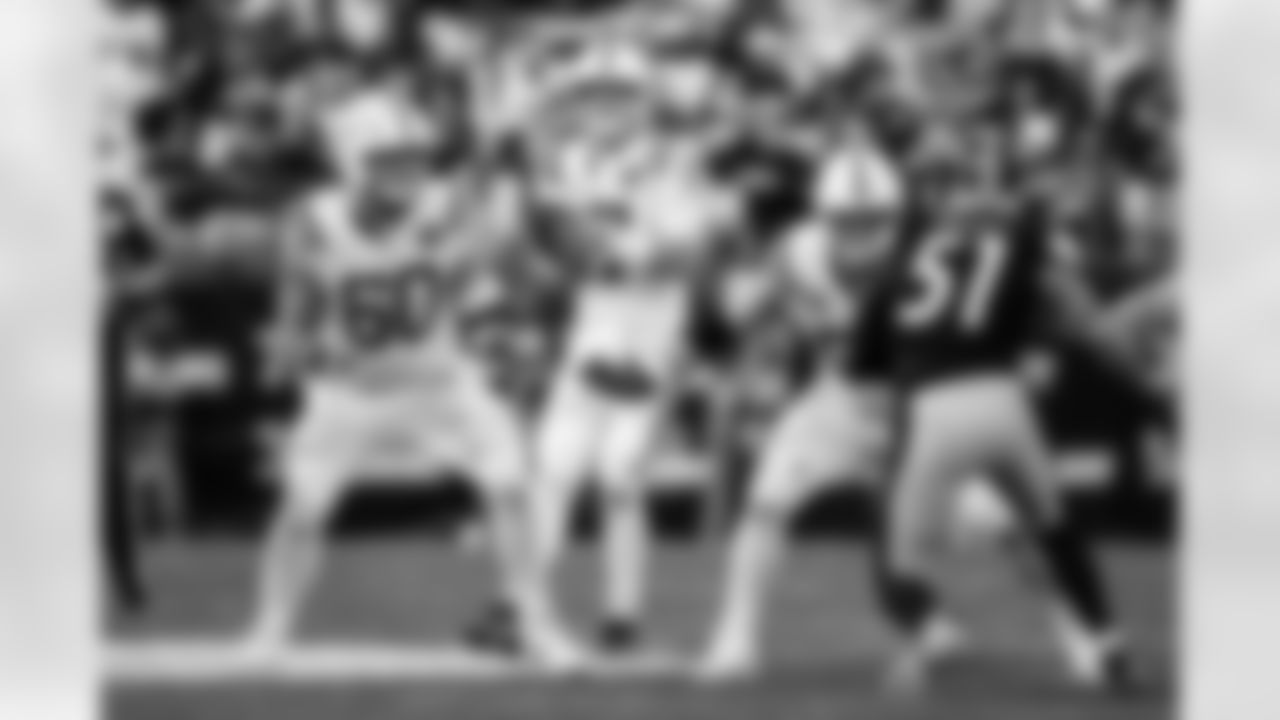 C Tanor Bortolini #60, QB Daniel Jones #17 and G Quenton Nelson #56