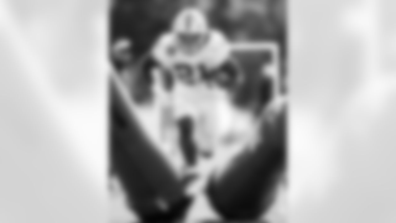 RB DJ Giddens #21