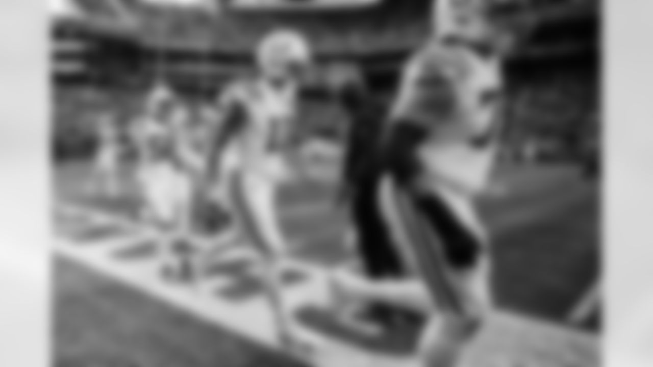 LB Austin Ajiake #58, WR Michael Pittman Jr. #11 and T Jalen Travis #75