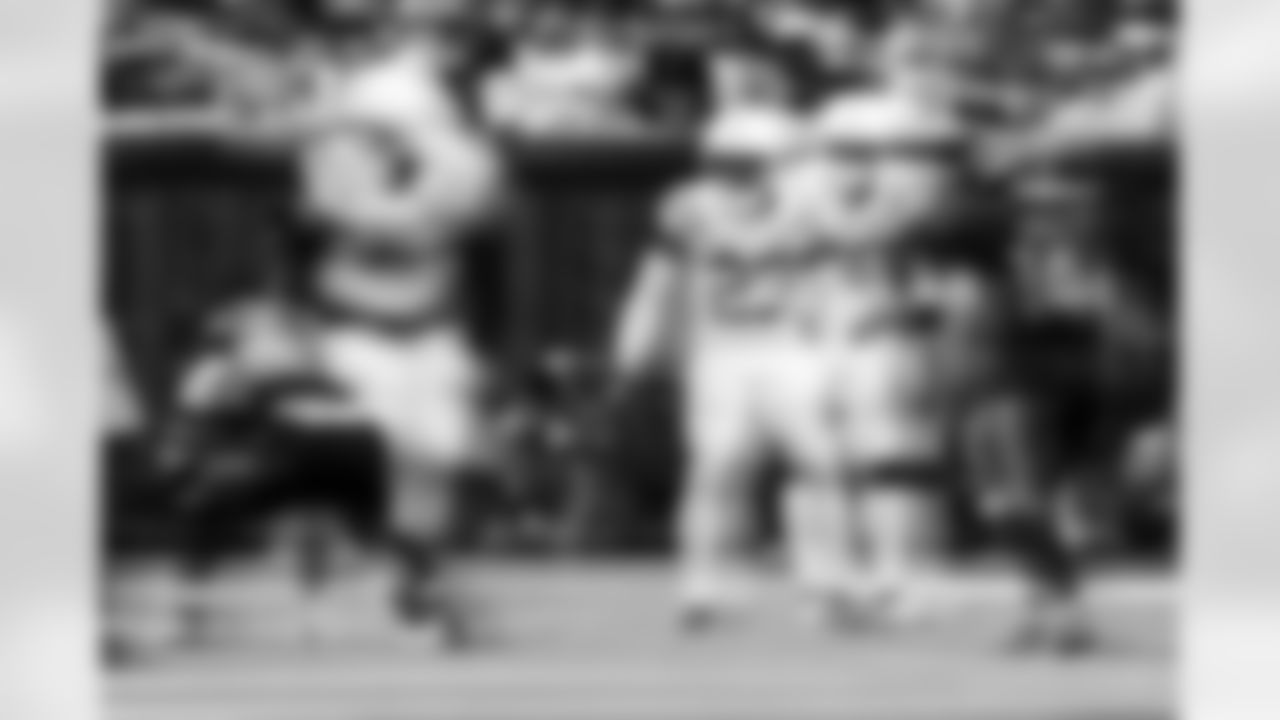 DE Laiatu Latu #97, CB Kenny Moore II #23 and CB Jaylon Jones #40