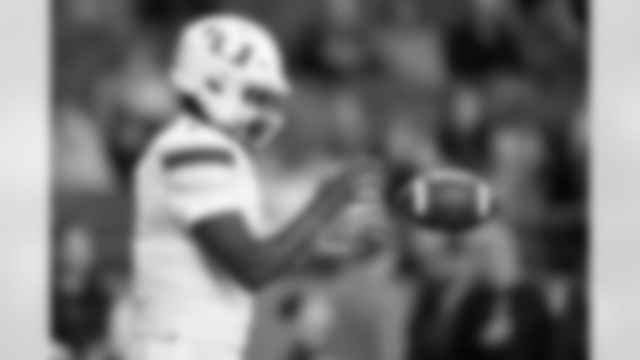 Miami quarterback Cam Ward (1) warms up before an NCAA college football game against Syracuse on Saturday, Nov. 30, 2024 in Syracuse, N.Y. (AP Photo/Adrian Kraus)