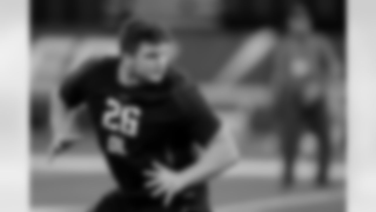 Notre Dame offensive lineman Quenton Nelson runs a drill at the NFL football scouting combine in Indianapolis, Friday, March 2, 2018. (AP Photo/Michael Conroy)