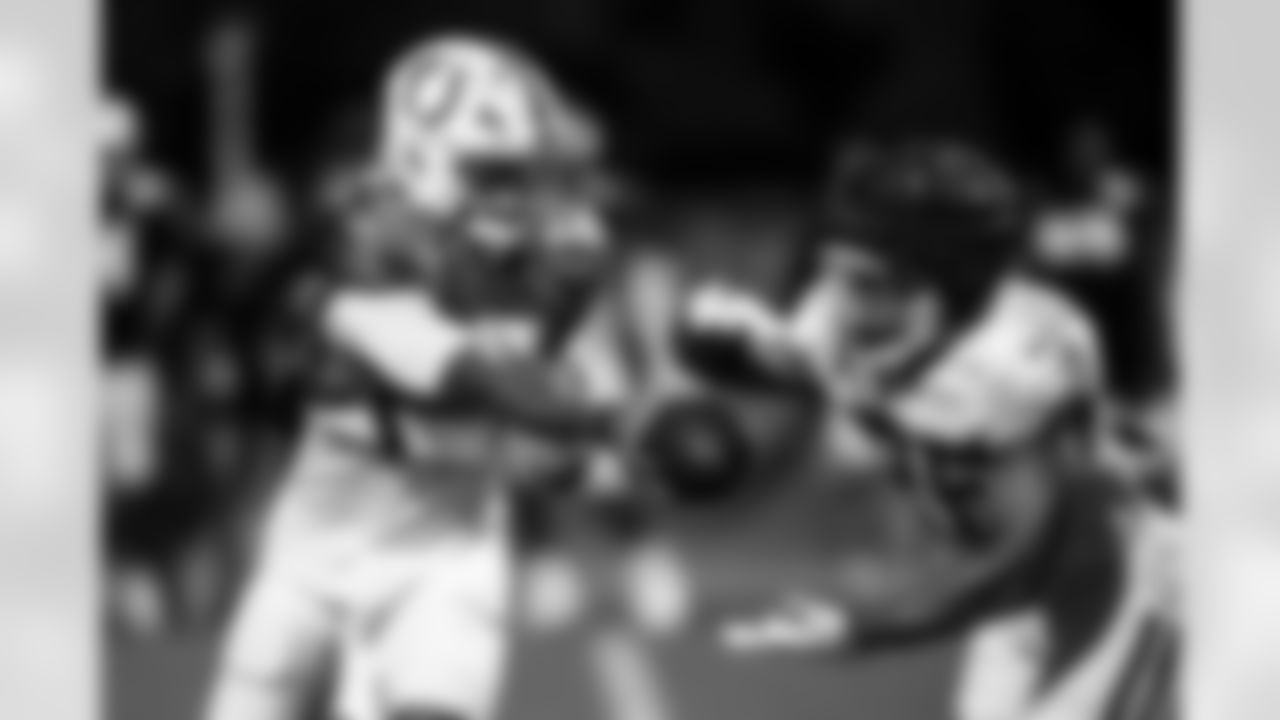 QB Anthony Richardson #5 and RB Khalil Herbert #26